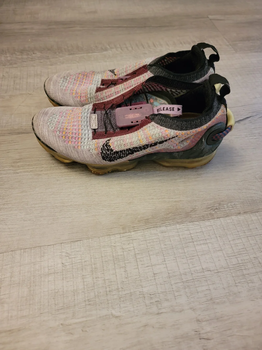 Nike Multicolor Flyknit Sneakers with Pink Accents